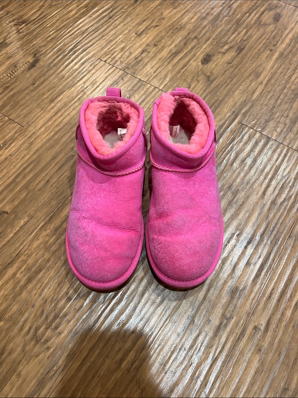 Women’s Pink Ugg Boots
Size: 7